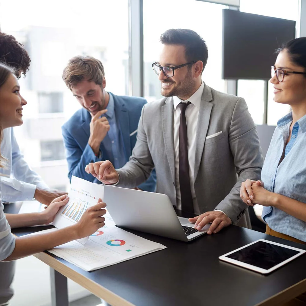 Business people discussing projects and charts